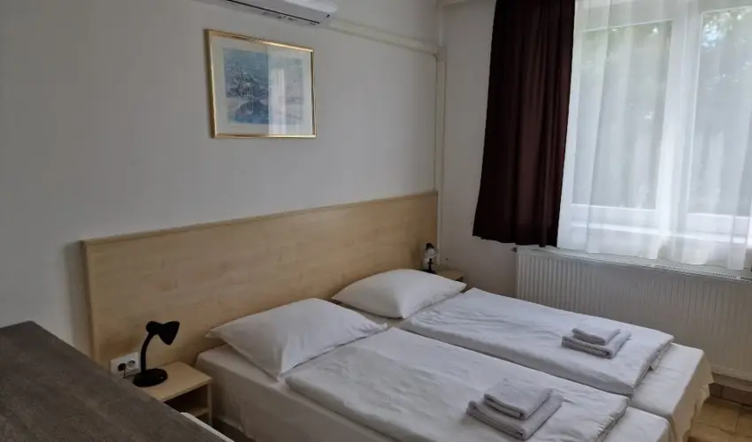 Lencs�s Apartmanh�z Apartmanok Sopron - P�nk�sd