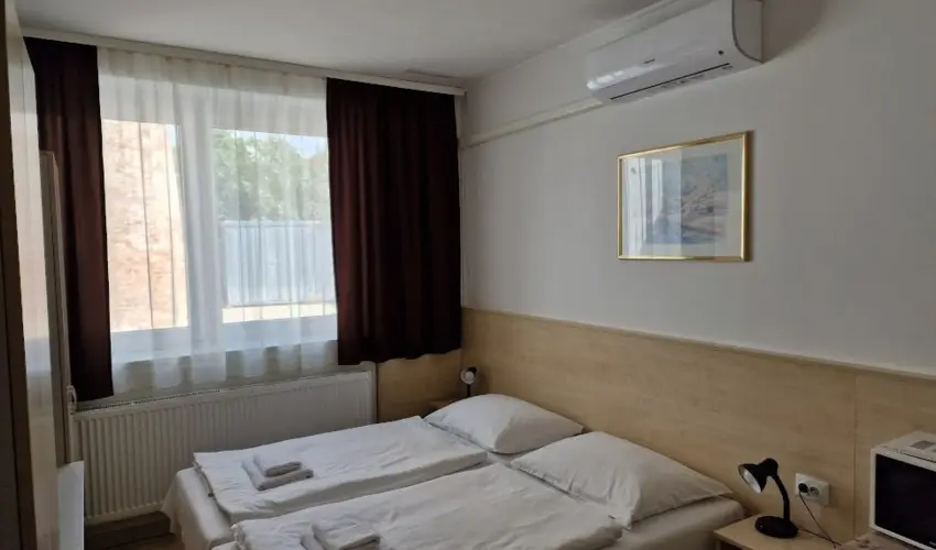 Lencs�s Apartmanh�z Apartmanok Sopron - P�nk�sd